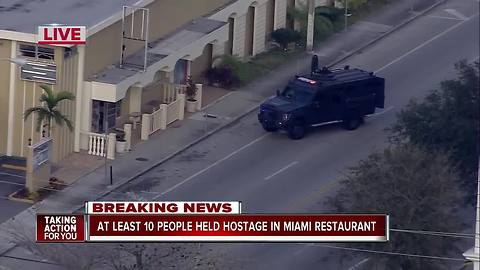 Police: Managers hold nearly 12 employees hostage at club in Miami