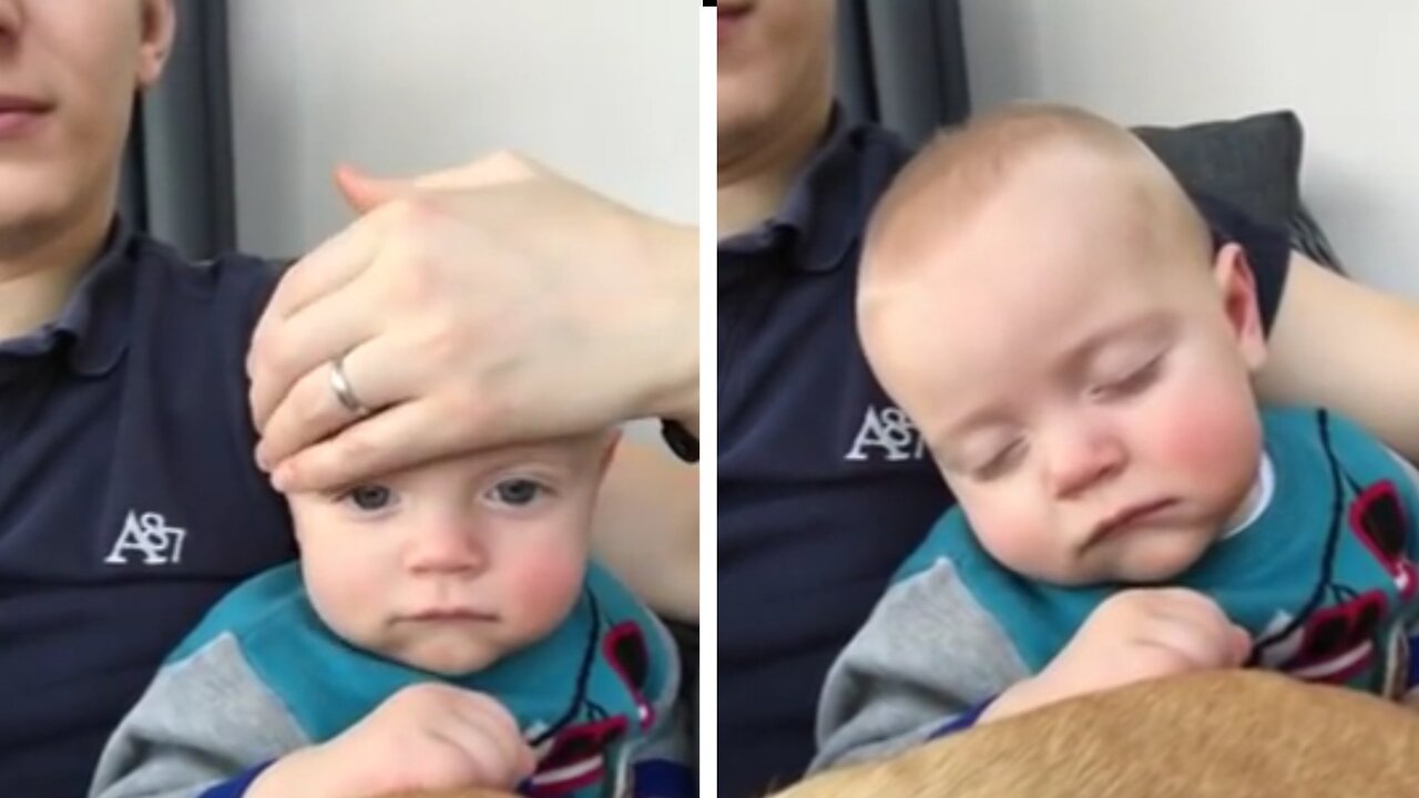 Dad Puts Baby to Sleep by Sliding Hand on Face