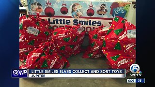 Little Smiles elves collect and sort toys in Jupiter