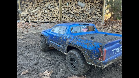 traxxas slash playing in the mud