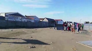 SOUTH AFRICA - Cape Town - Joe Slovo Community member invade open lady (Video) (q2Q)