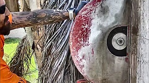 Cutting a wall in the backyard.