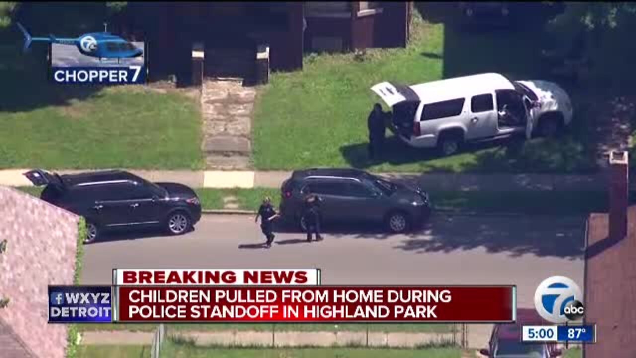 Children pulled from home during police standoff in Highland Park