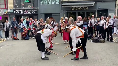 Morris dancing! English folk dance based on rhythmic stepping & execution of choreographed figures.