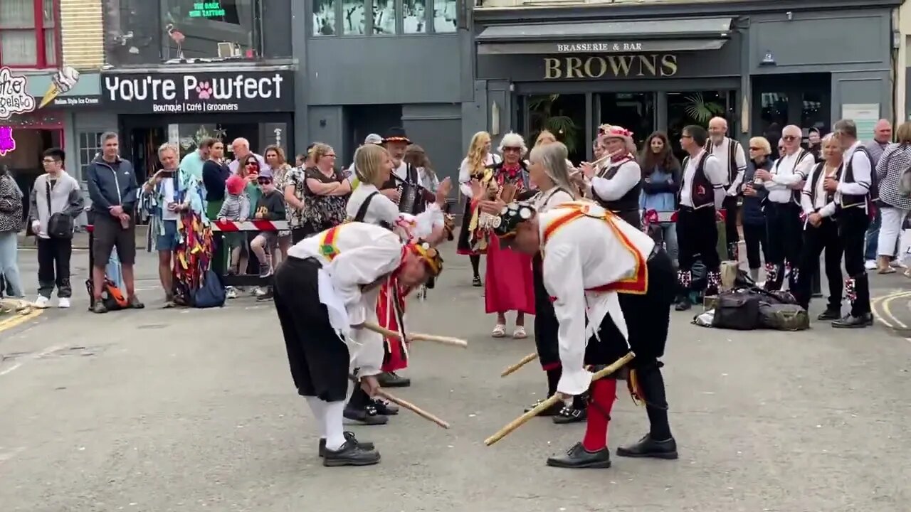 Morris dancing! English folk dance based on rhythmic stepping & execution of choreographed figures.