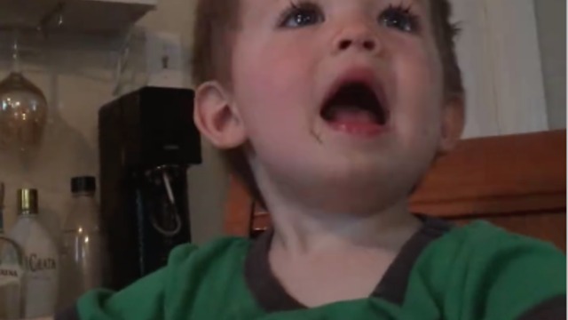 Cute baby boy prays before meal, then practices preaching at mealtime