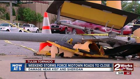 Cleaning up midtown after weekend tornado