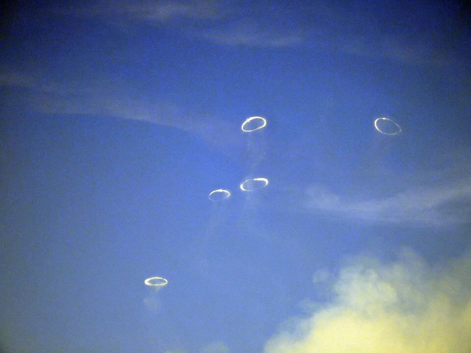 Strange clouds observed today at the Mount Etna, during latest partial eruption