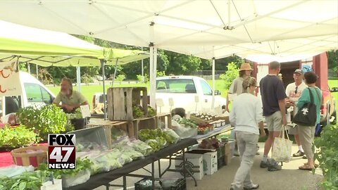 Rain not stopping farmers at East Lansing Farmer's Market