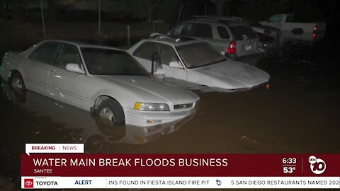 Broken water main floods Santee street, auto repair business