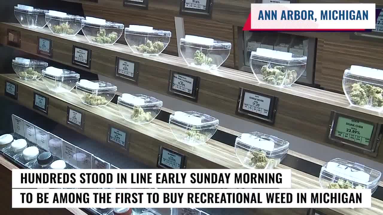 Crowds of people line up for first day of legal marijuana sales in Michigan