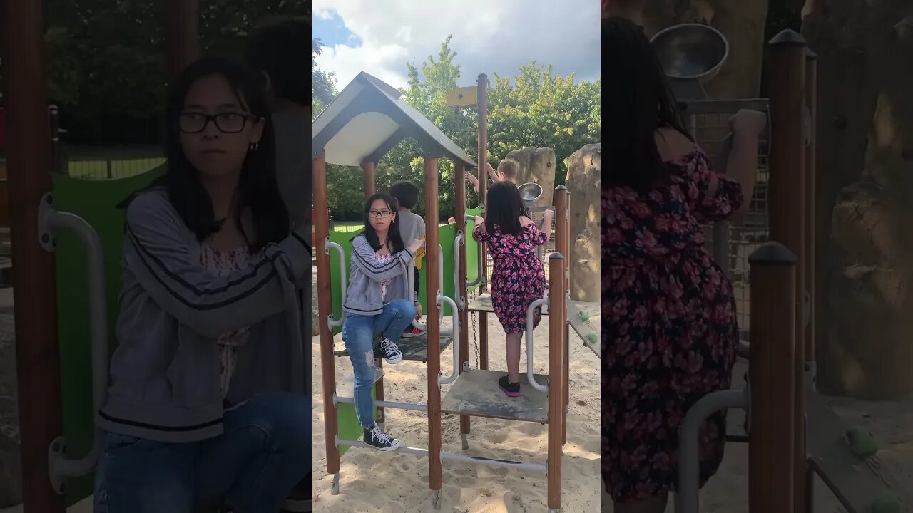 Baby girls and little boy have loads of fun in the park