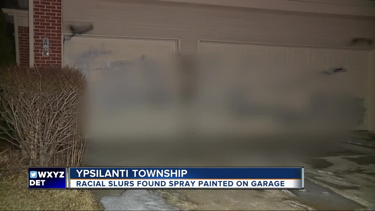 Ypsilanti Township family wakes up to racial slurs, derogatory language spray painted on garage