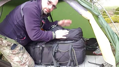 putting the axe and rocket pouch on the snugpak Bergen. Darrmoor 26th March 2023