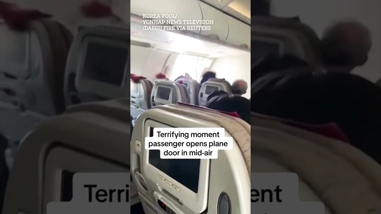 Terrifying momentpassenger opens planedoor in mid-air.