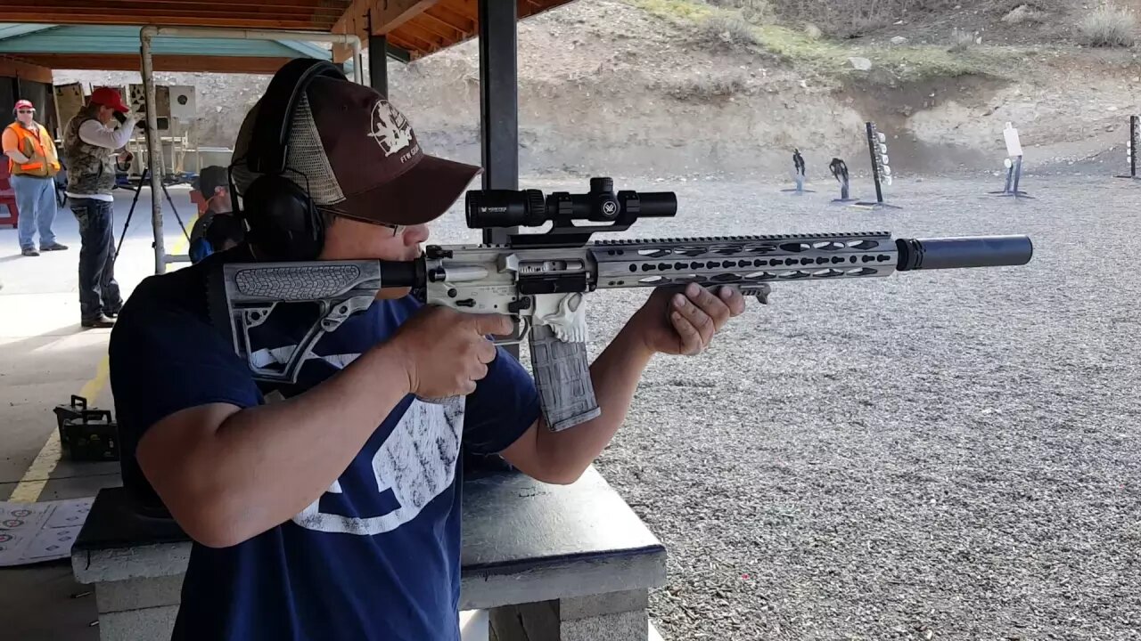 Ave shooting his new AR-15 in .223 Wylde with SilencerCo Omega suppressor