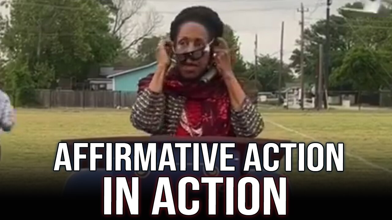 Congresswoman Jackson Lee STRUGGLES to put her eclipse glasses in EMBARRASSING display