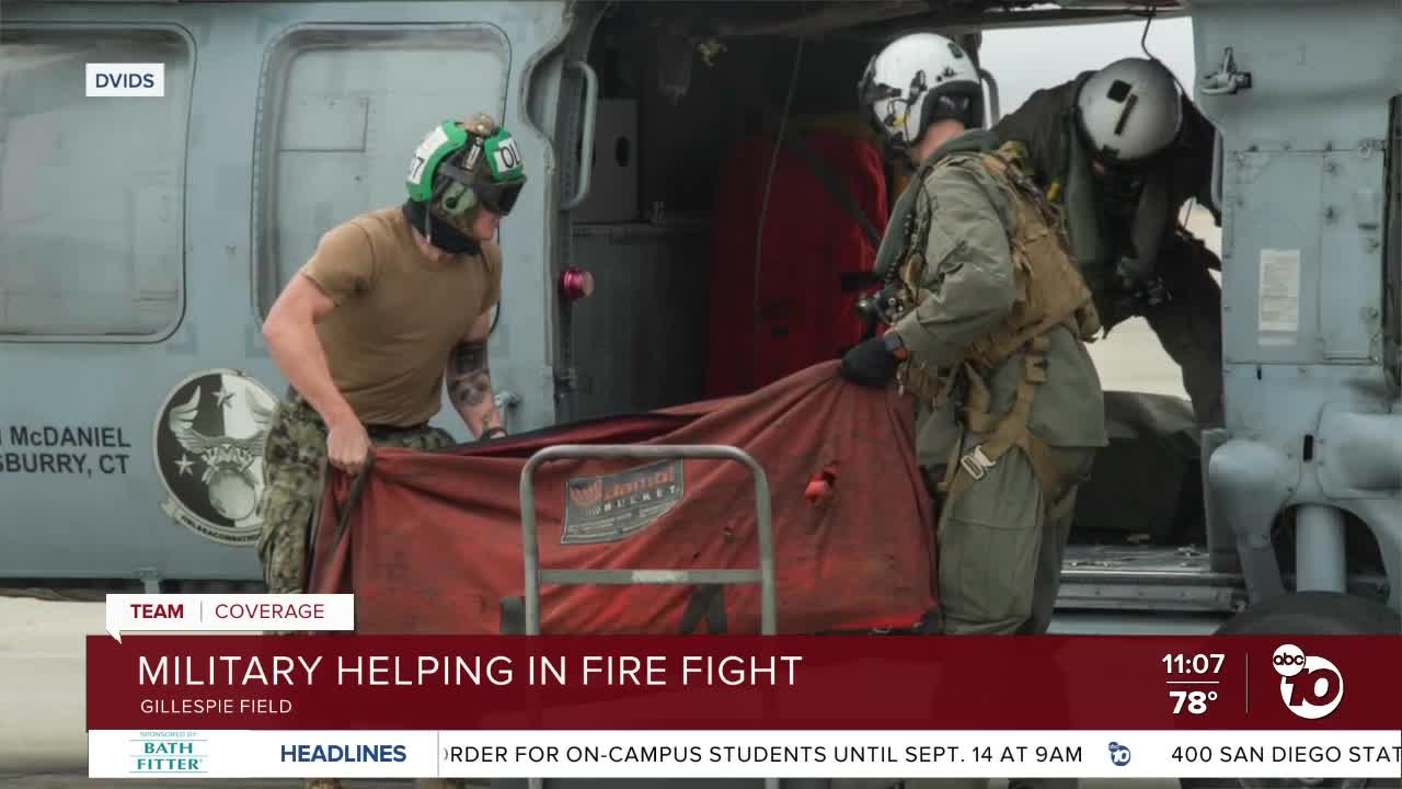 Military helping in fire fight