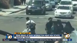 VIDEO: Teens brawl at busy intersection near high school