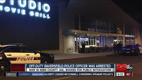 Off-Duty Officer Falls Asleep in Theater With Gun On Lap