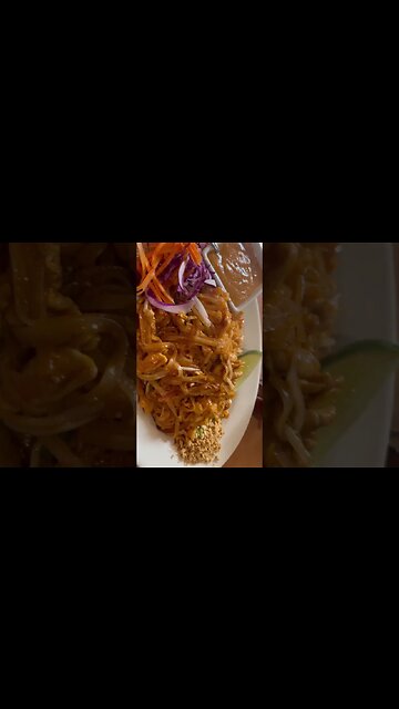Eating Pad Thai chicken with extra chicken and Thai Peanut Sauce to add with some lime.