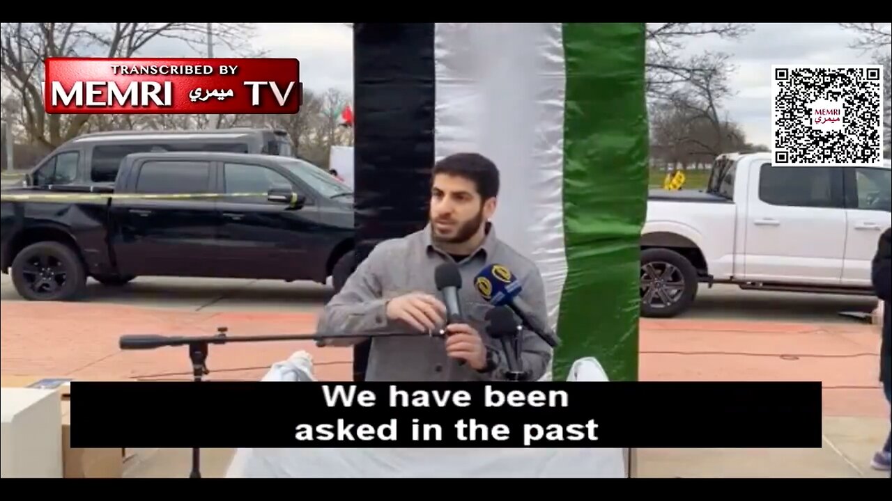 Captioned - An activist leads Muslims in Dearborn MI