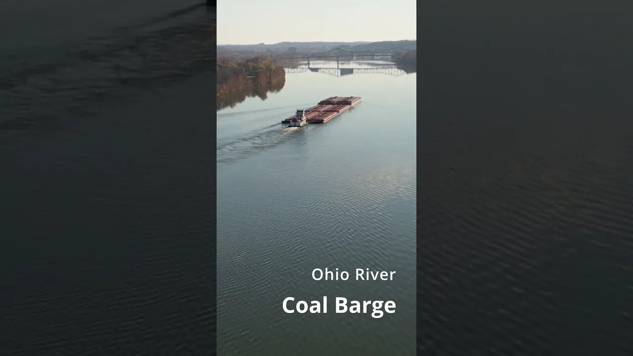 DRONE SHOT - Ohio River COAL BARGE Chugging up the River