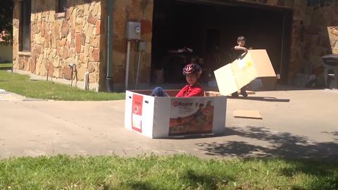 Young Boy Rides In A Go Cart