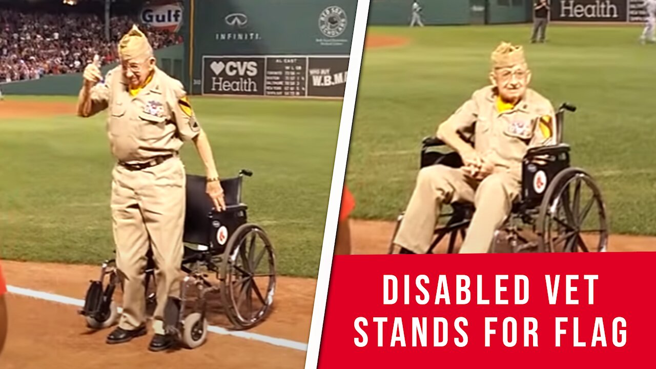 Disabled Veteran Stands for the Flag