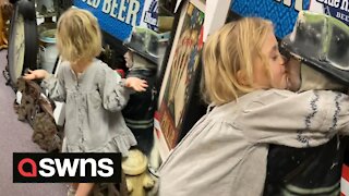 Hilarious moment US mum catches daughter secretly smooching a FIREMAN STATUE