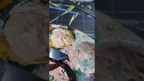 Peeling paint off a pallet