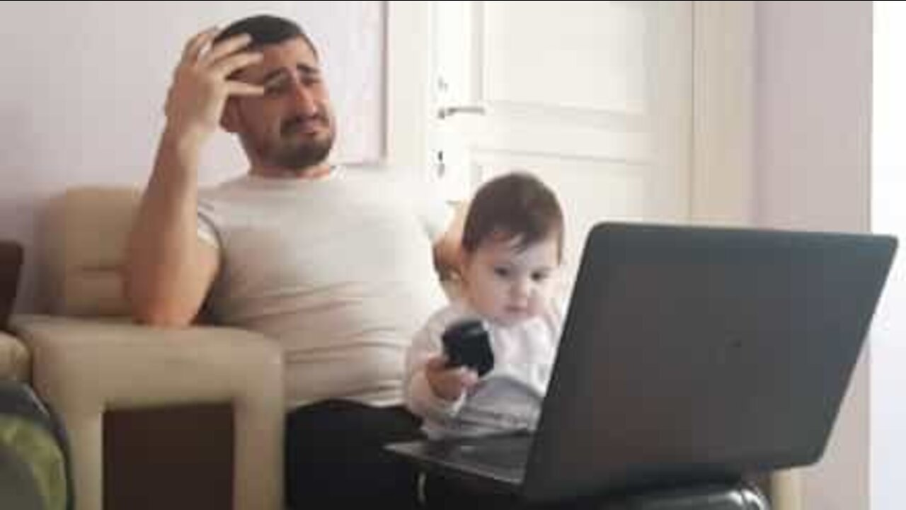 Baby makes dad's work from home impossible!