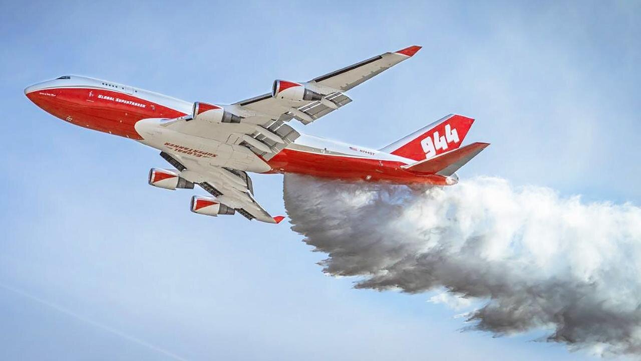 Firefighter's plane dumps 70 tons of water on a forest in Chile