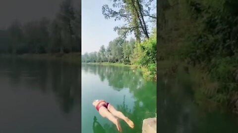 Young Chinese Girl Goes To A Lake To Dive And Swim