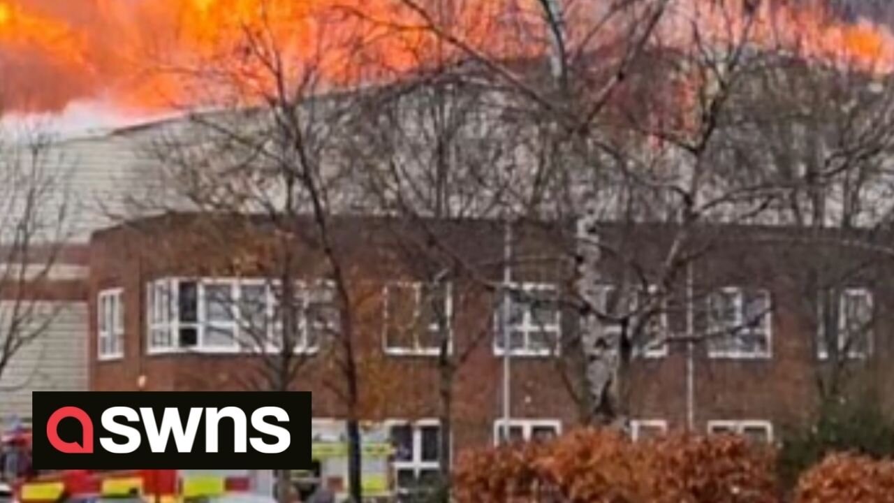 Dozens of UK firefighters fight to control an enormous blaze