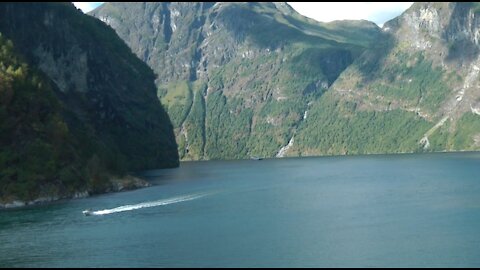 Boats Sailing On A Huge Body Of Water