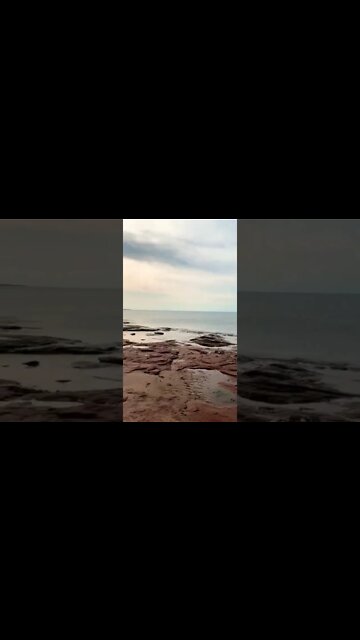 Walking around rocky part of beach