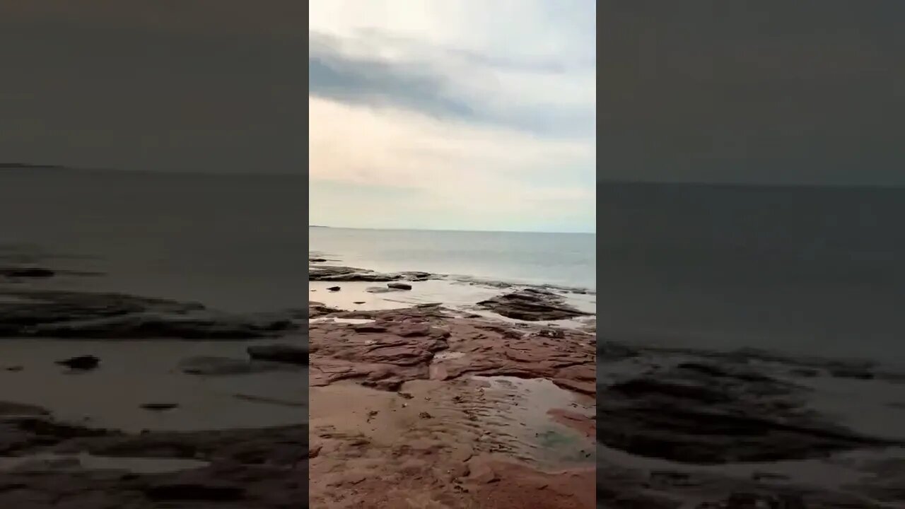 Walking around rocky part of beach