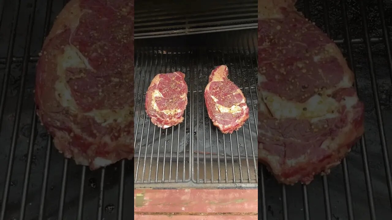 ￼ Ribeye steaks on the grill for supper.