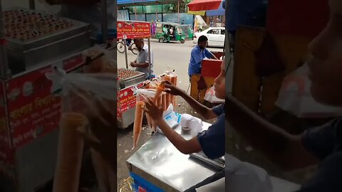 Hardworking boy selling icecream