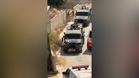 Israeli regime's troops tie a wounded man to a hood of their armored vehicle as human shield