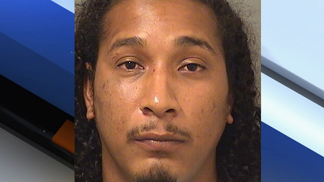 Palm Beach Co. man charged with pointing gun at child