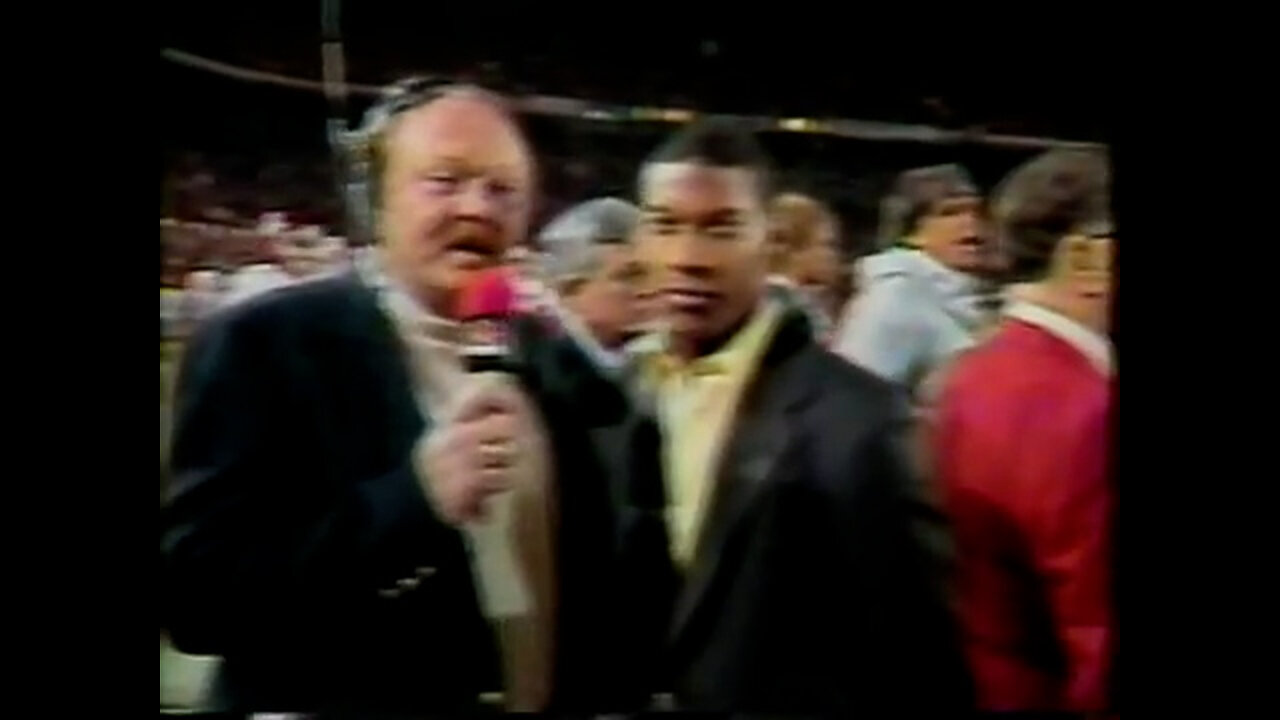 January 2, 1987 - Paul Maguire Talks with Bobby Joe Edmonds During the Orange Bowl