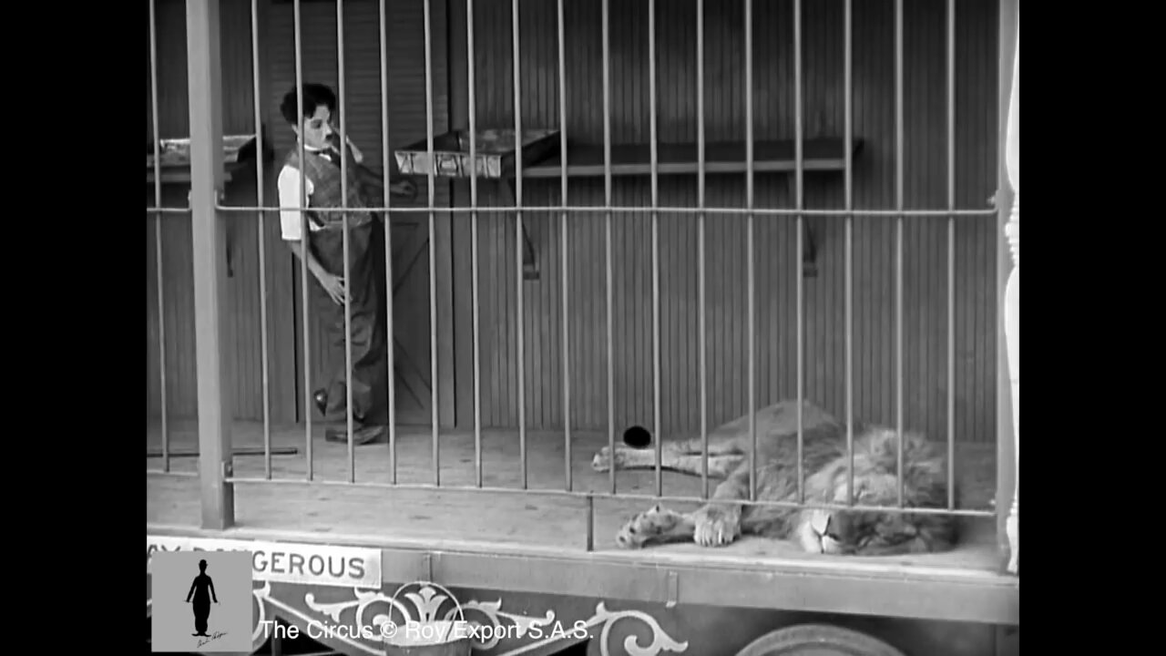 Charlie Chaplin funny scene lion cage