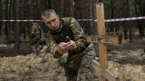 Ukraine Combs Mass Burial Site, Says Russia 'Leaves Death'