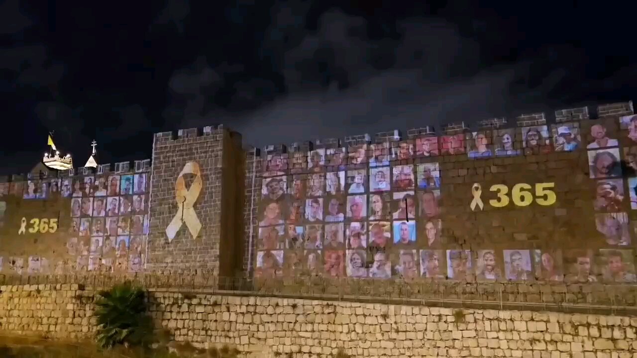 The walls of Jerusalem tonight. 365 days in captivity! BRING THEM HOME NOW!