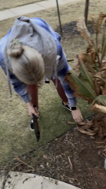 Pretty lady wielding survival knife is pretty sexy