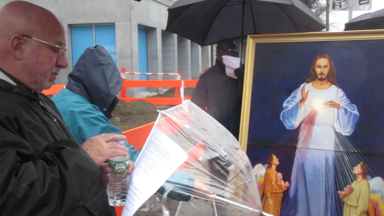 Fr Imbarrato blessing holy water at Planned Parenthood Boston ma 4 21 17