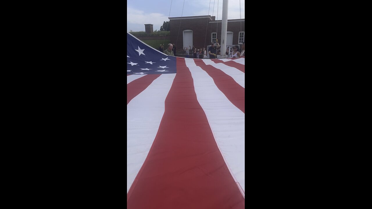 American Flag being raised over Fort McHenry Baltimore MD