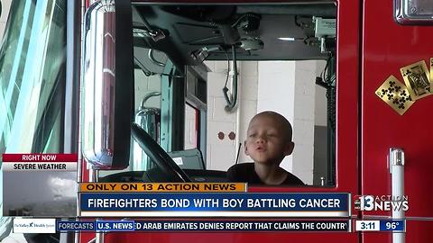 Firefighters form bond with young boy with cancer